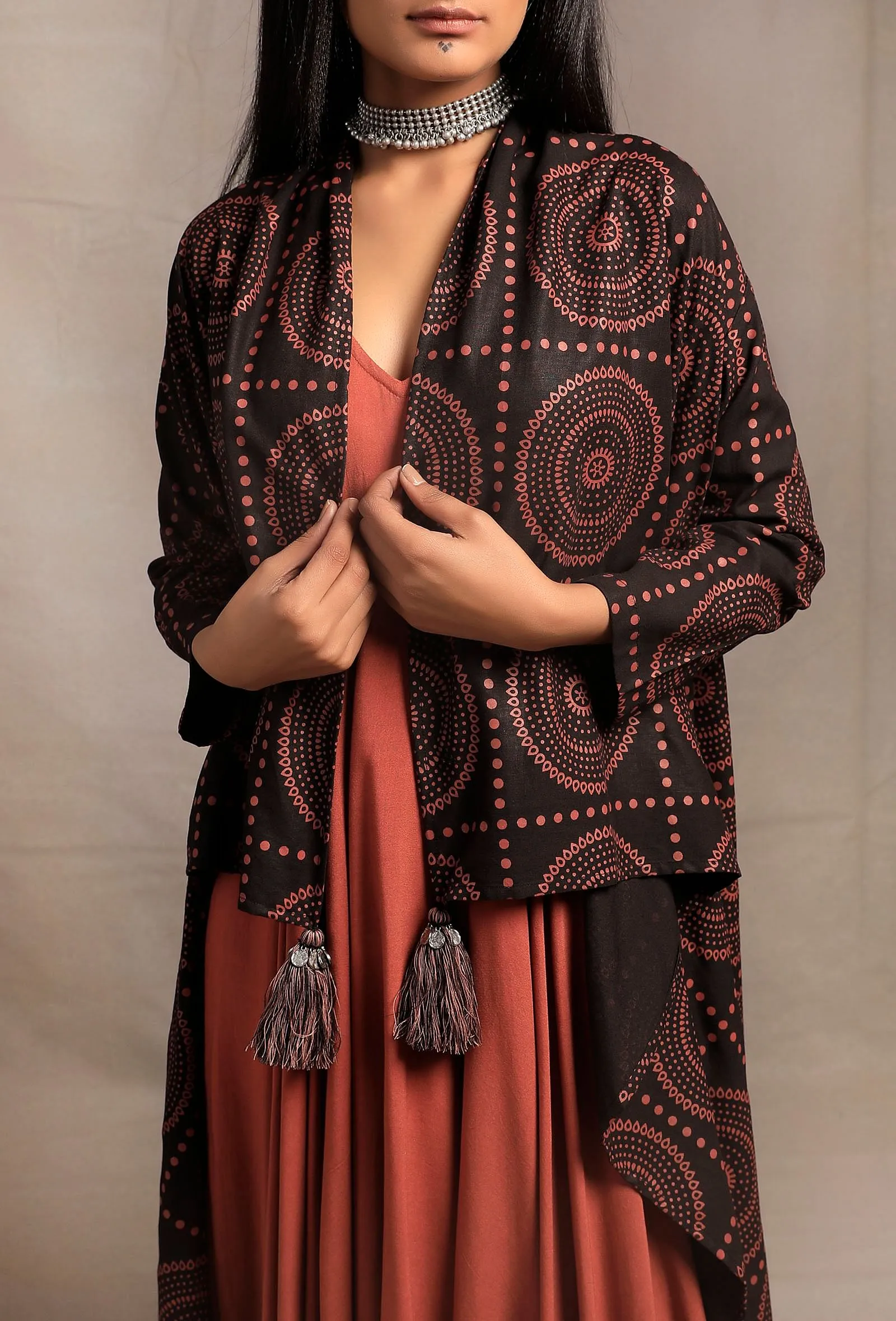 Set of 2: Black Front Open Asymmetrical Printed Shrug with Burnt Brick Sleeveless Asymmetrical Dress